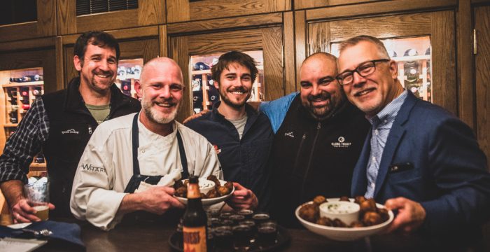 chef and guests at chef's table.